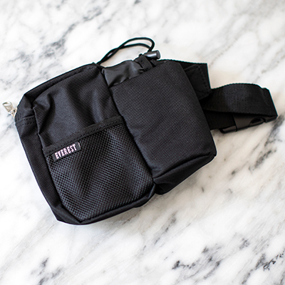 EVEREST<sup>&reg;</sup> Waist Bottle Pack—Features a Zippered Pouch with an Insulated Bottle Holder. For wear around the waist with snap-enclosure and measures 7"x 7.5"x 3" 
